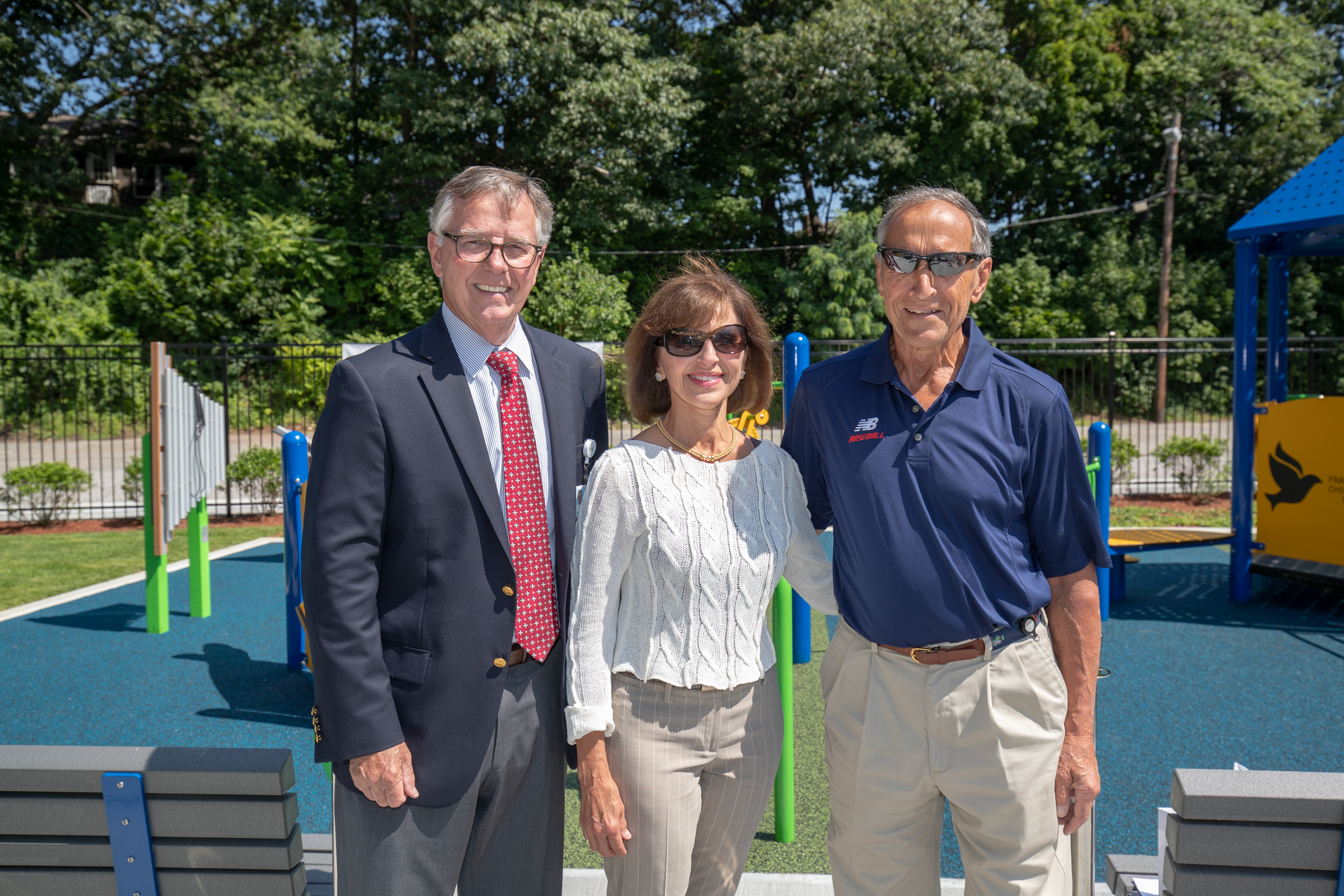 Franciscan Children's President and CEO, John Nash, together with New Balance's Jim and Anne Davis.   